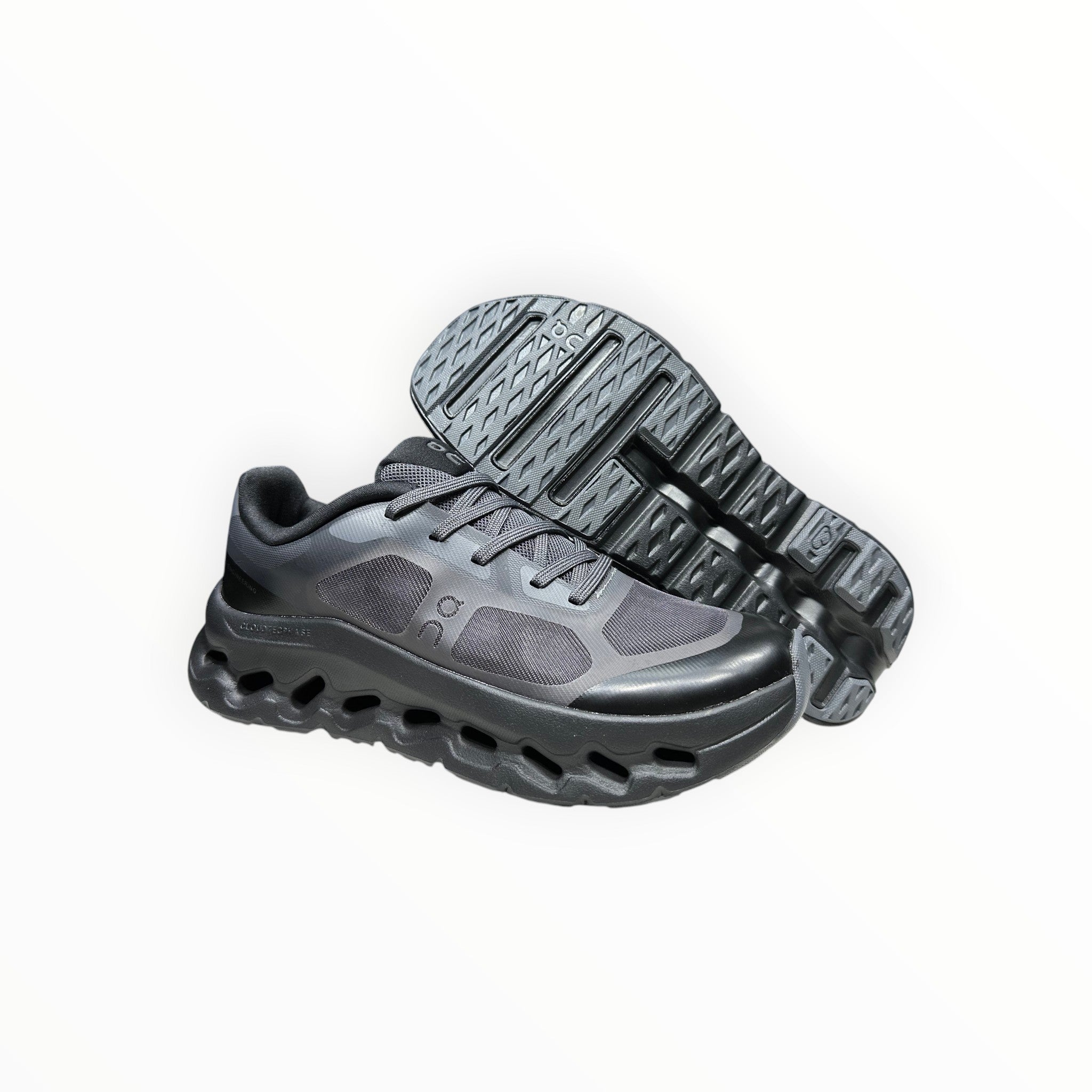 EWW Sports Shoes black On Cloudtilt Remix running shoes with see-through x-ray effect upper and CloudTec Phase cushioning.
