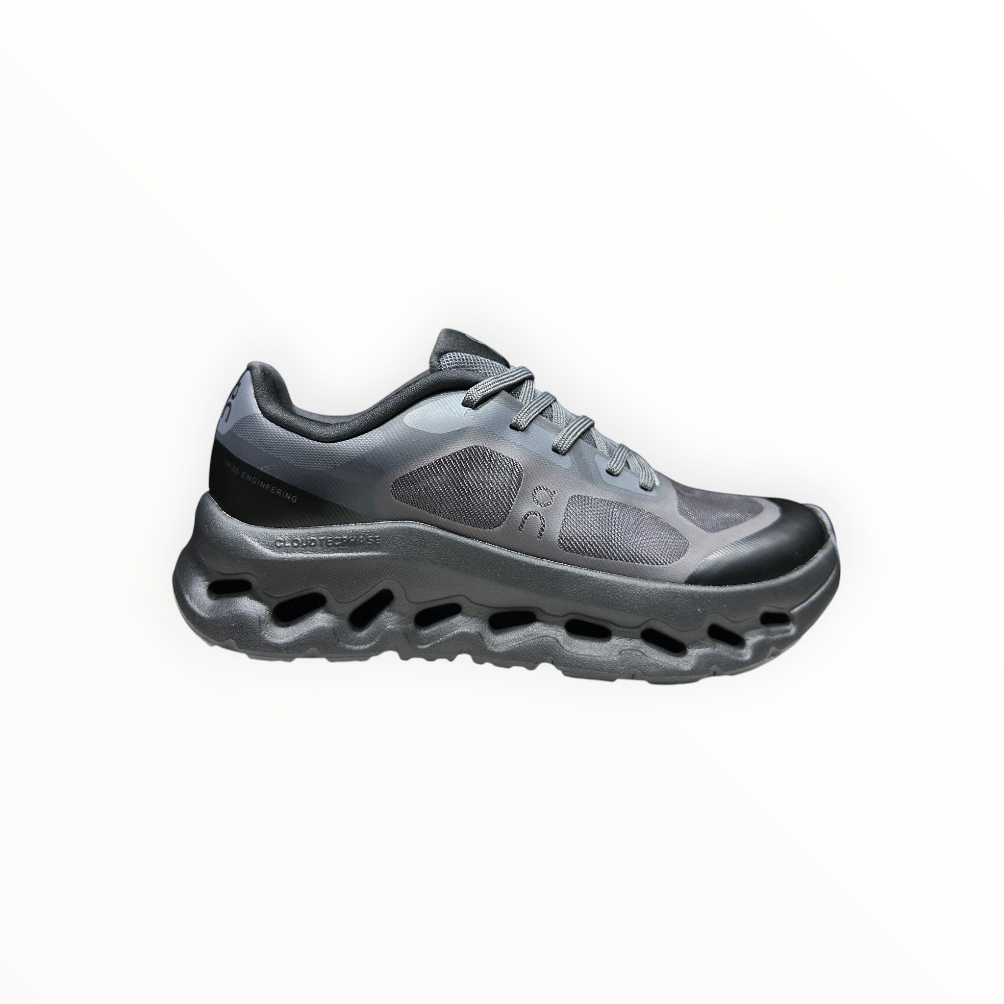 EWW Sports Shoes black On Cloudtilt Remix sneakers with see-through x-ray effect upper and CloudTec Phase cushioning.