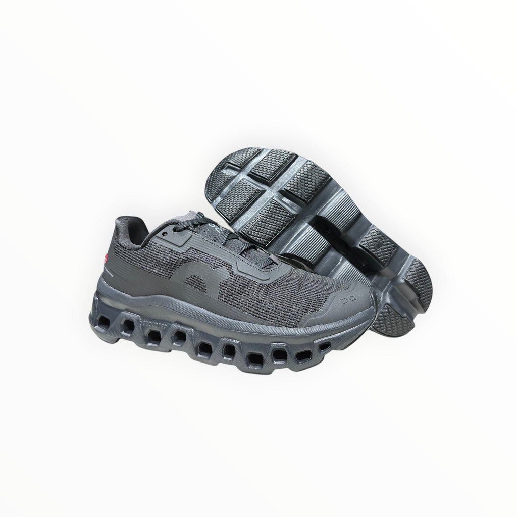 EWW Sports Shoes black On Running Cloudmonster Void running shoes with breathable mesh upper and signature CloudTec cushioning.