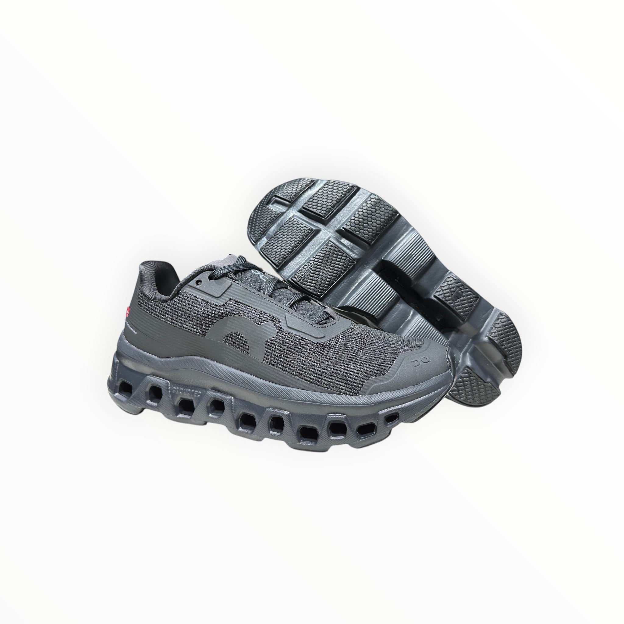 EWW Sports Shoes black On Running Cloudmonster Void running shoes with breathable mesh upper and signature CloudTec cushioning.