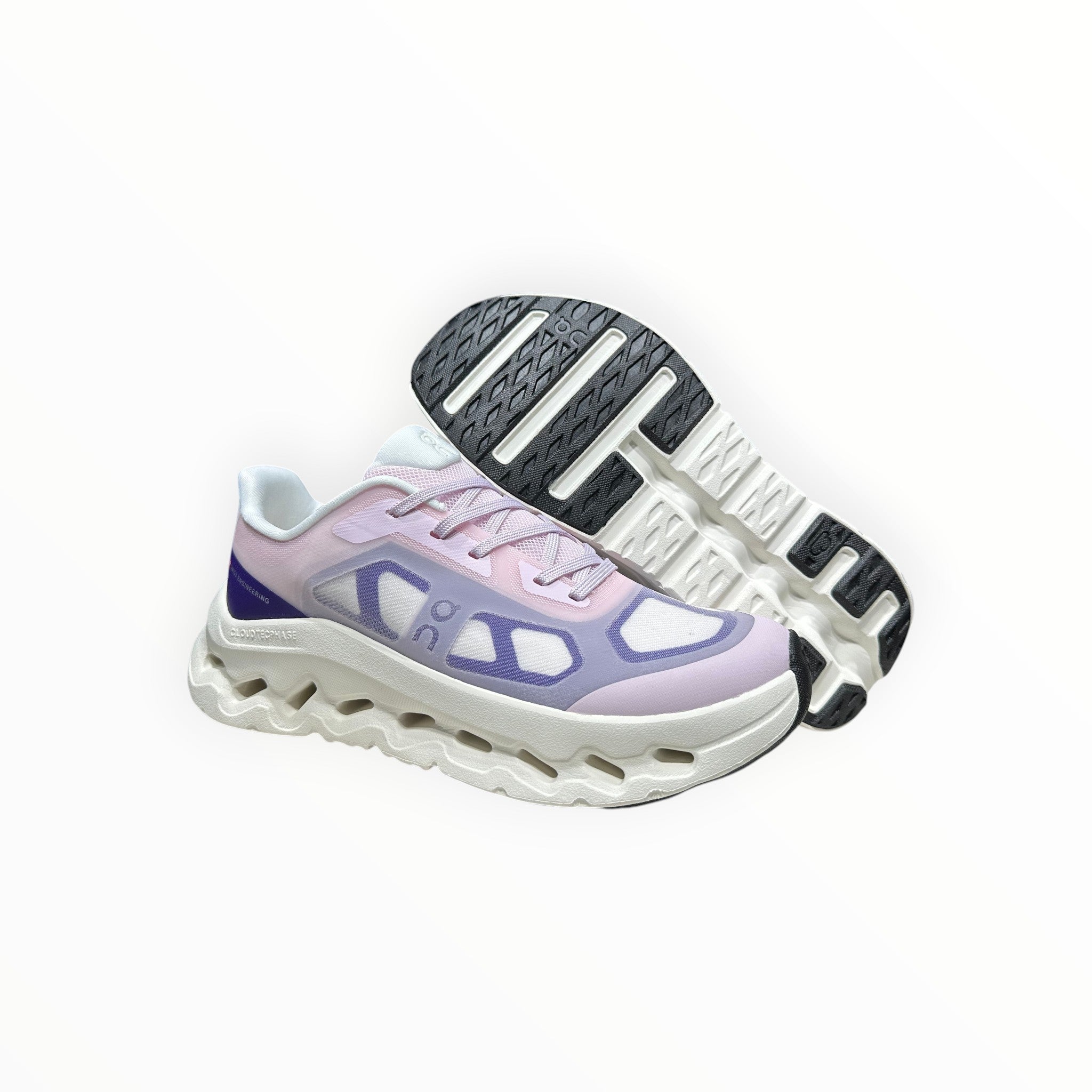 EWW Sports Shoes On Cloudtilt Remix pink and purple sneakers with layered see-through upper and white sculpted sole.