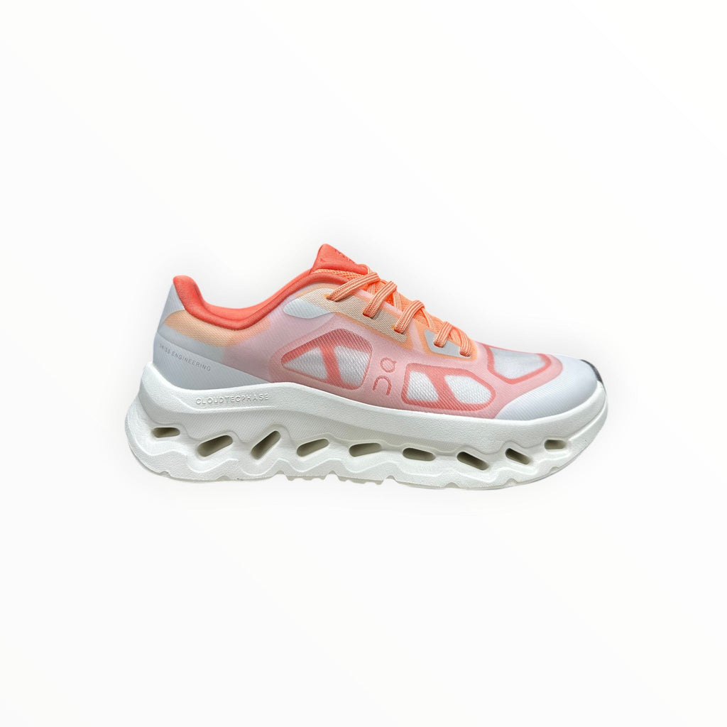 EWW Sports Shoes On Cloudtilt Remix grey and orange running shoes with see-through upper and white chunky sole.