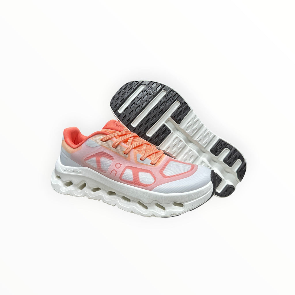 EWW Sports Shoes On Cloudtilt Remix grey and orange running shoes with see-through upper and white chunky sole.