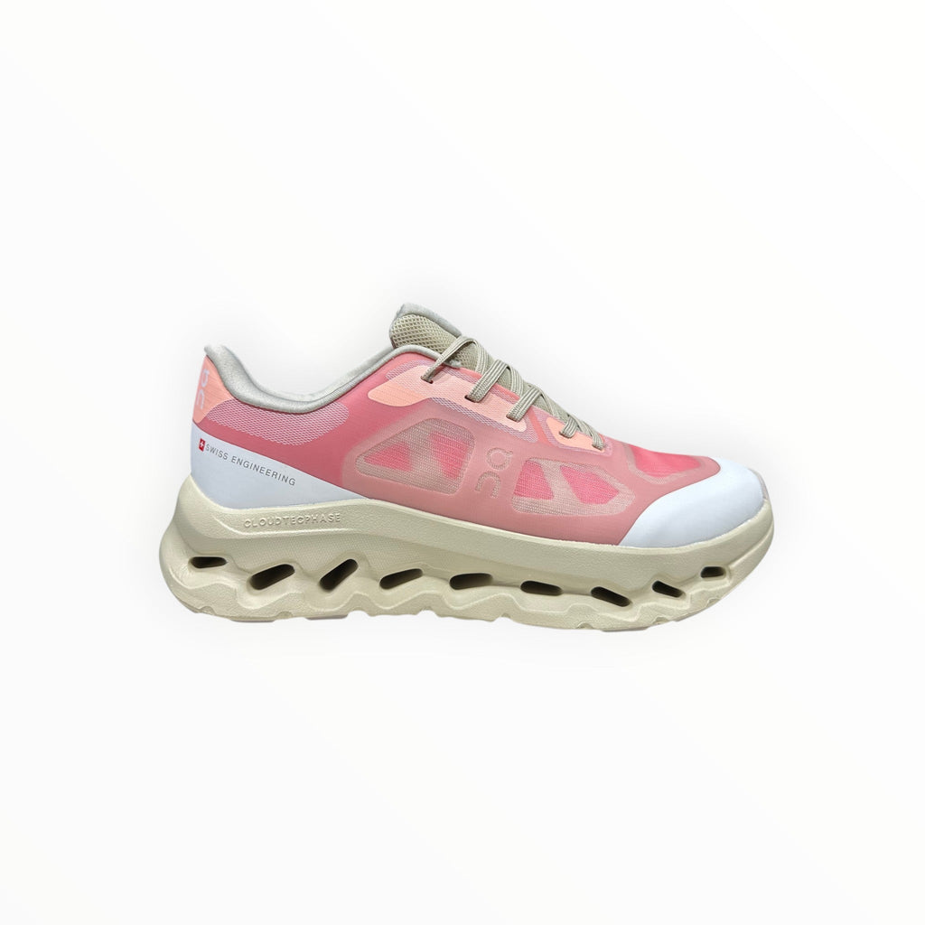 EWW Sports Shoes On Cloudtilt Remix pink and cream running shoes with see-through upper and unique cushioned sole.