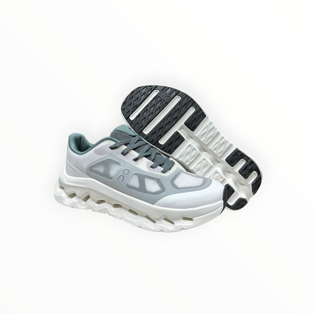 EWW Sports Shoes On Cloudtilt Remix white and light blue sneakers with a see-through x-ray effect upper and white chunky sole.