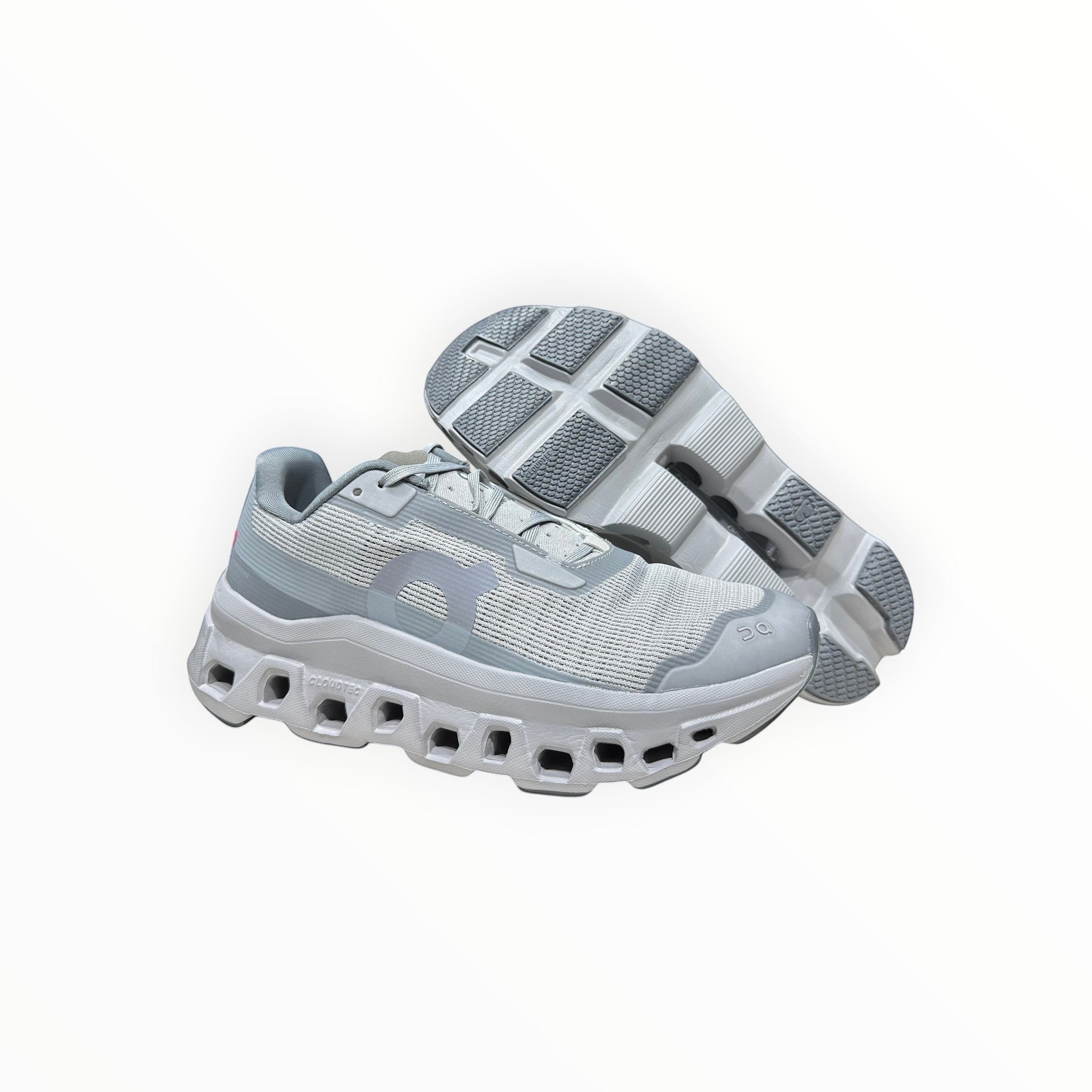 EWW Sports Shoes On Running Cloudmonster Void running shoes in alloy gray and glacier gray, with breathable mesh upper and signature CloudTec cushioning.